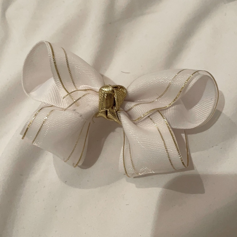 Gold and white designer bow
